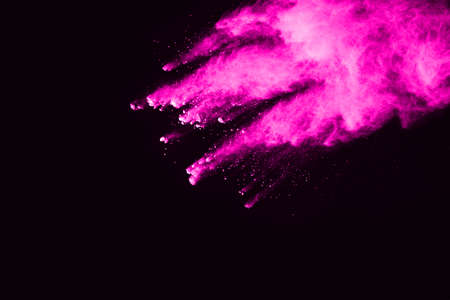 Abstract pink powder splatted background,Freeze motion of color powder exploding/throwing color powder,color glitter texture on white background.の写真素材