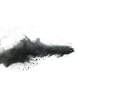 abstract colored dust explosion on a black background.の写真素材