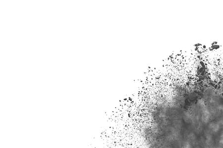 abstract colored dust explosion on a black background.の写真素材