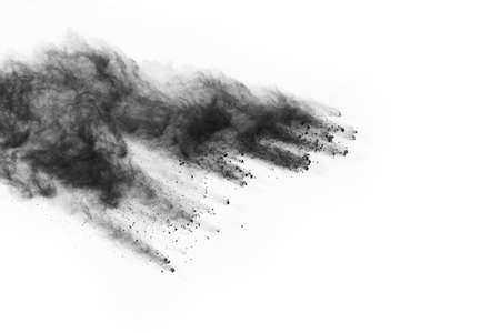 abstract colored dust explosion on a black background.の写真素材