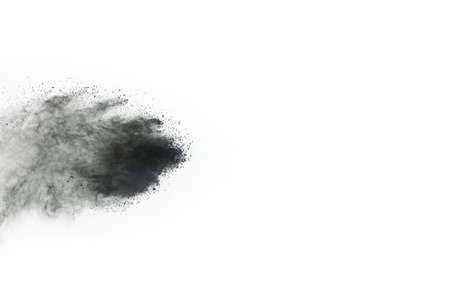 abstract colored dust explosion on a black background.の写真素材