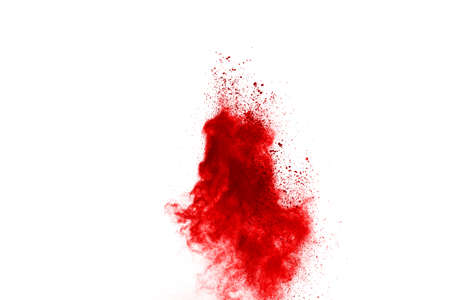 Freeze motion of red powder exploding, isolated on white background. Abstract design of red dust cloud. Particles explosion screen saver, wallpaperの写真素材