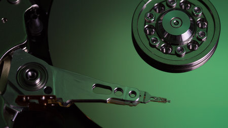 Disassembled hard drive from the computer, hdd with mirror effect Opened hard drive from the...
