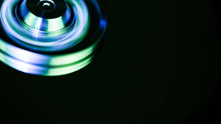 Disassembled hard drive from the computer, hdd with mirror effect Opened hard drive from the computer hdd with mirror effects Part of computer pc, laptop Closeup HDDの写真素材
