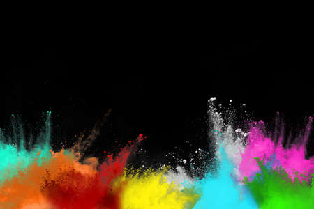 abstract colored dust explosion on a black background.abstract powder splatted background,Freeze...