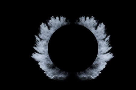 White powder explosion on black background. Colored cloud. Colorful dust explode. Paint Holi.