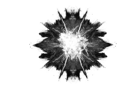 abstract black powder explosion on a white background. monochromeの写真素材