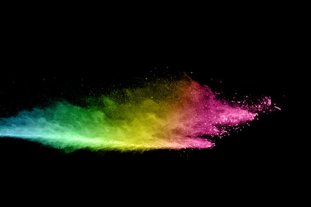 abstract colored dust explosion on a black background.abstract colored dust explosion on a black background.の写真素材
