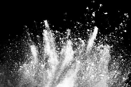 Splashes of water on a black background. Black and white.の写真素材