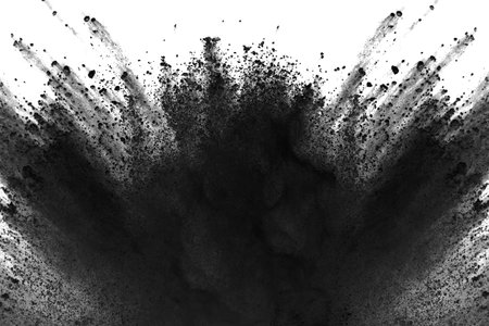 Explosion of colored powder, isolated on white background. Abstract design of black dust cloud.の写真素材