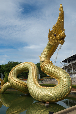 naga statue on the waterの写真素材
