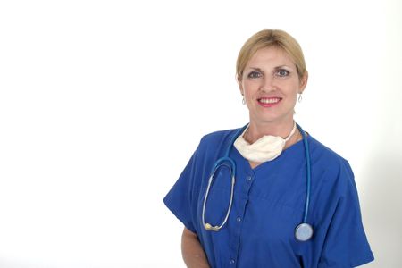 headshot photo of nurse or doctor with stethoscope and surgical mask after a successful surgery or operation or procedureの写真素材