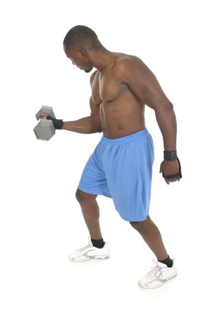 Handsome male with bulging muscles lifting weights.の写真素材