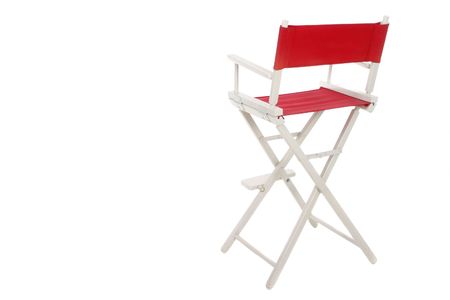 Director's chair with red seat and back on a white frame. Isolated on white background.  Copyspace room on left for text.の写真素材