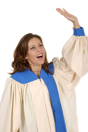 Woman in church choir robe with her arms raised singing in charismatic praise to God.  Shot isolated on white background.  Horizontal orientation.の写真素材