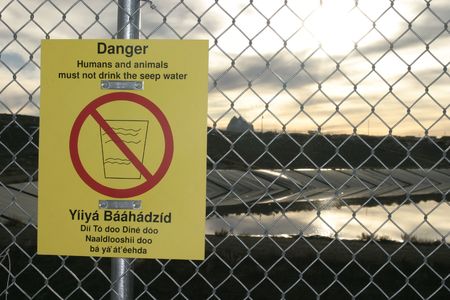 Danger Human and animals must not drink the seep water sign on Navajo Indian Reservation (Navajo Nation) near Shiprock, New Mexicoの写真素材