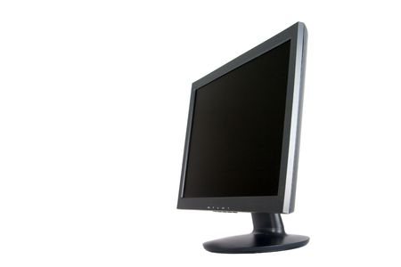 Angle view of black/dark grey wide screen computer monitor.の写真素材