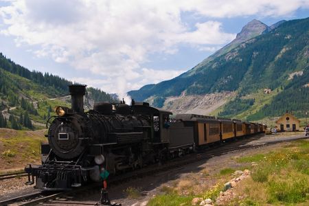 The historic narrow gauge Durango-Silverton steam locomotive approaches Silverton, Colorado.の写真素材