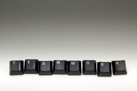 Keyboard buttons arrange in row to form a teamwork wordの写真素材