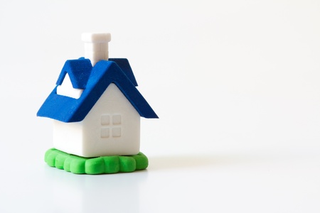 Miniature house model isolated on white backgroundの写真素材