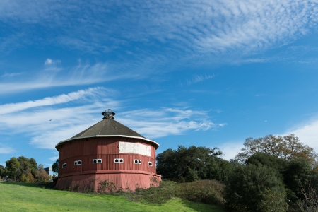 Historical red round barn at Fountaingrove Santa Rosa, Californiaの写真素材