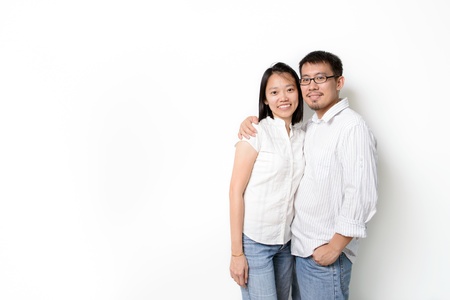Happy young Asian couples isolated on white backgroundの写真素材