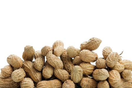 Pile of peanuts isolated on white backgroundの写真素材