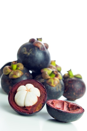Fresh mangosteen fruit isolated on white backgroundの写真素材