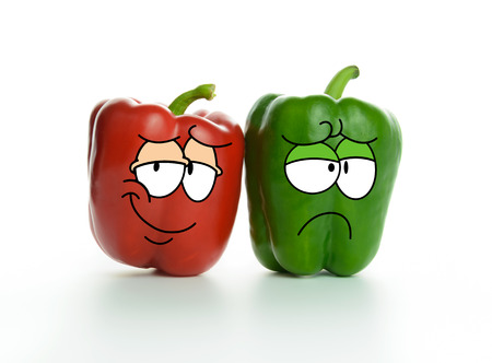 Happy and sad paprika couple on whiteの写真素材