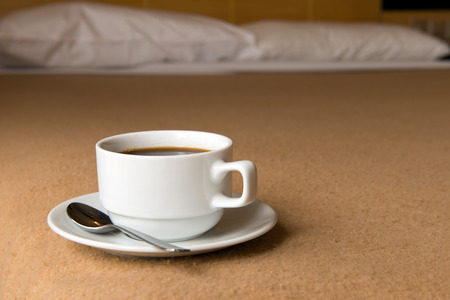 Close up of black coffee in hotel bedroomの写真素材