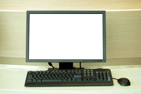 Blank computer monitor with keyboard and mouse