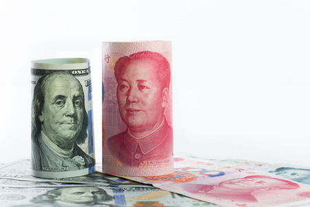 US one hundred dollar versus China Yuan currencyの写真素材