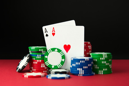 Close up of poker aces and casino chips