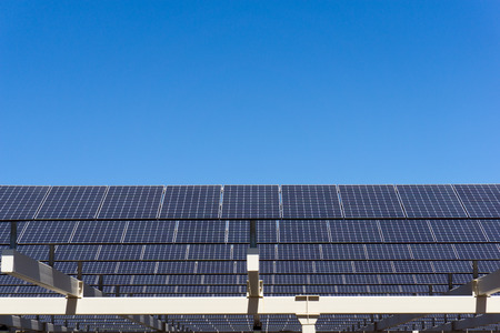Shot of solar panel against clear blue skyの写真素材