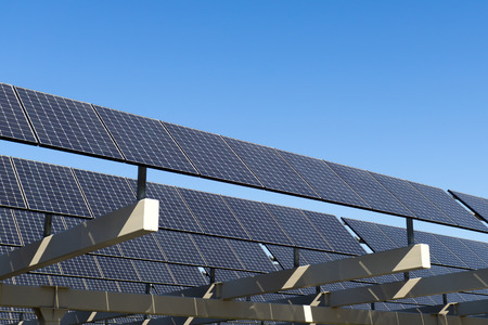 Shot of solar panel against clear blue skyの写真素材