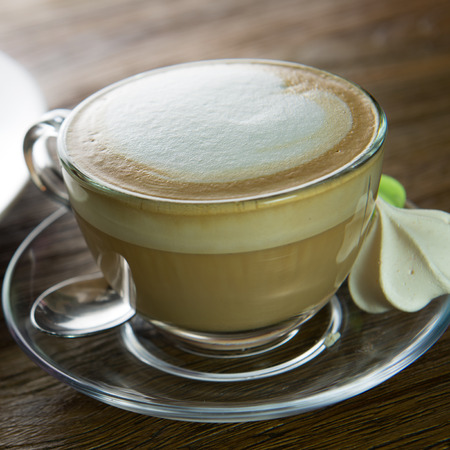 Cup of cappuccino coffee for afternoon tea breakの写真素材