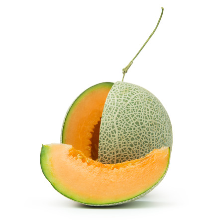 Close up of orange cantaloupe melon on white backgroundの写真素材