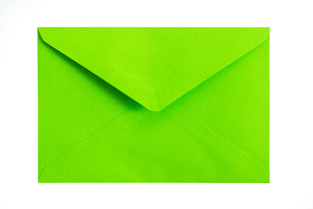 Close up of green envelope on white backgroundの写真素材