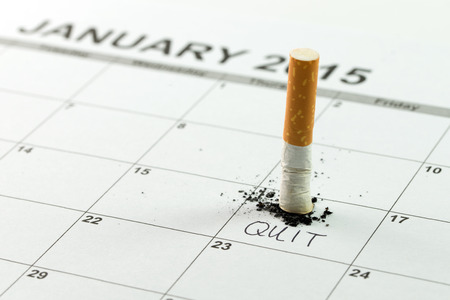 Time to quit smoking concept using cigarette on calendarの写真素材
