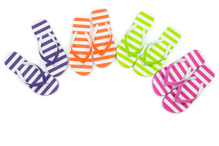 Multicolor striped flip fliops on white backgroundの写真素材