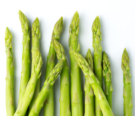 Close up of fresh asparagus on white backgroundの写真素材