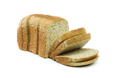 Whole wheat bread loaf on white backgroundの写真素材