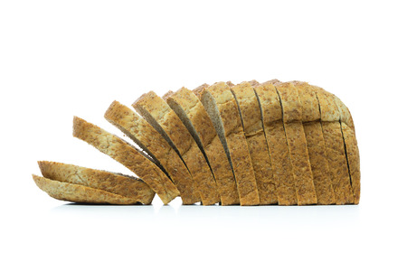 Whole wheat bread loaf on white background