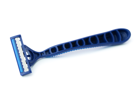 Close up of blue razor on white backgroundの写真素材