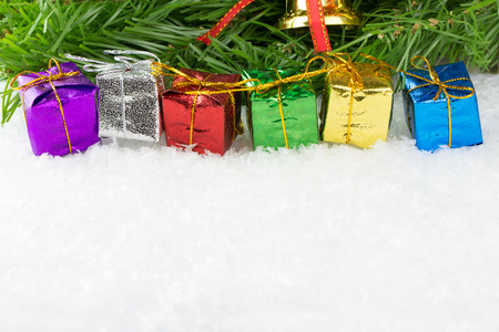 Multicolor Christmas presents on white background, with copy spaceの写真素材