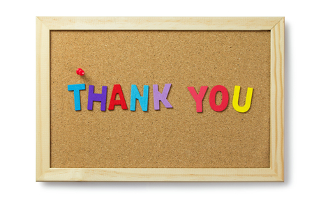 Colorful thank you word letters on cork notice boardの写真素材