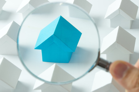 House searching concept with a magnifying glassの写真素材