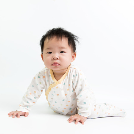 Portrait of Asian baby girl on white backgroundの写真素材
