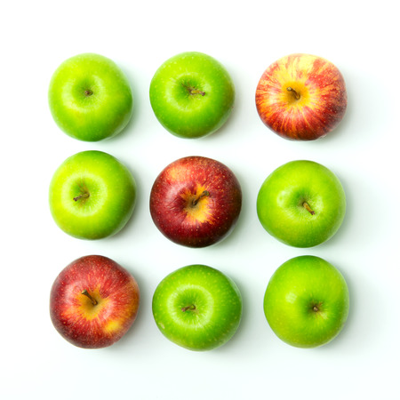 Tic tac toe game using apples on white backgroundの写真素材