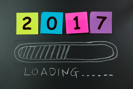 Loading bar drawn on chalkboard indicating new year 2017